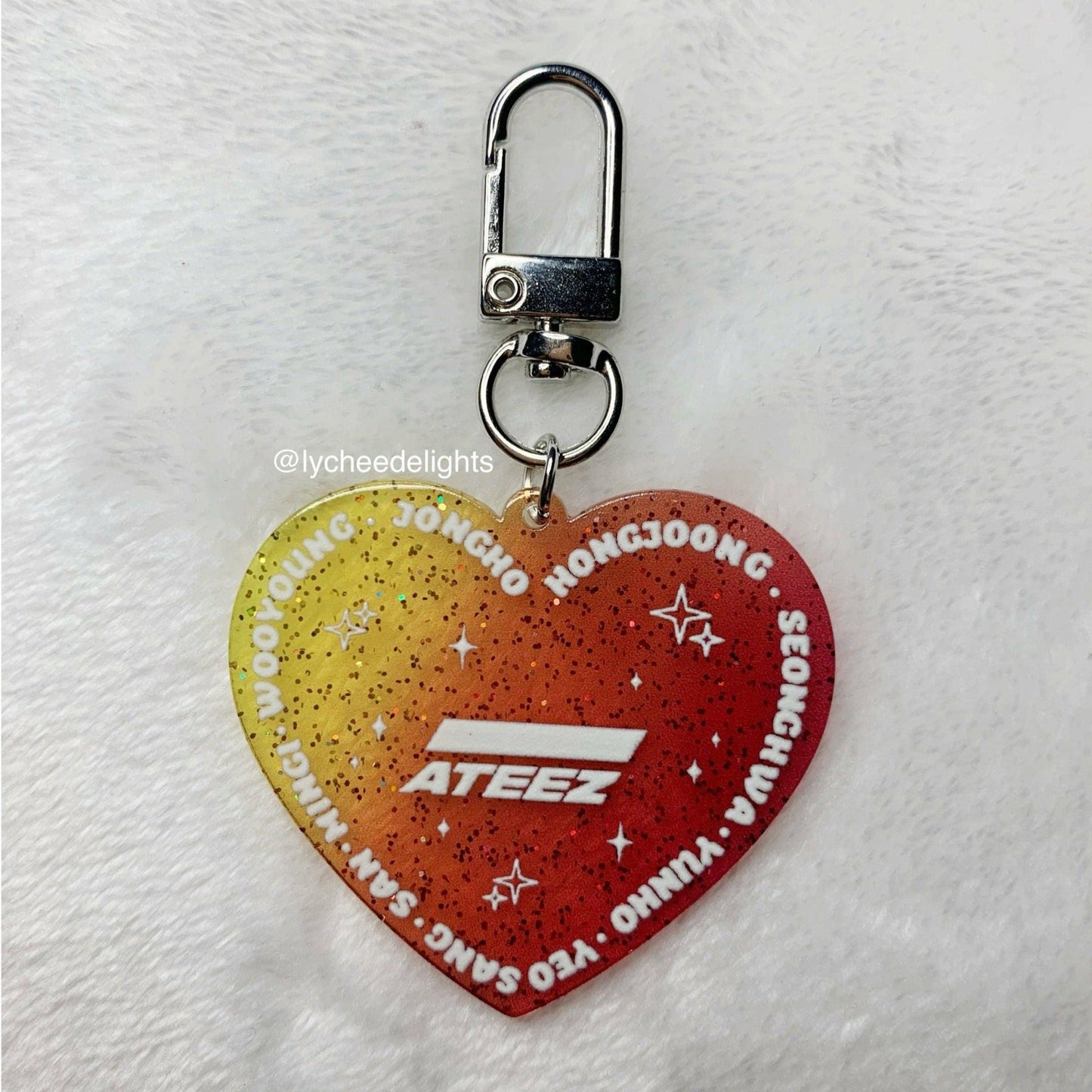 ATEEZ Heart Keychain - MilkBunn Co. Front detail of keychain. Red to yellow ombre, glitter acrylic.