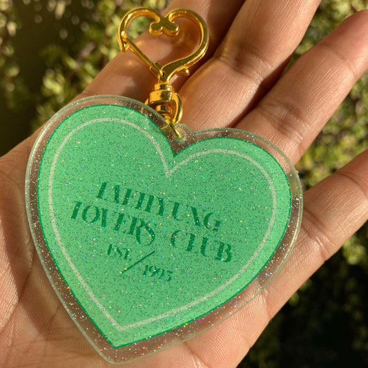 TAEHYUNG Lovers Club Keychain - MilkBunn Co. Taehyung from BTS inspired keychain. Green glitter acrylic heart keychain.
