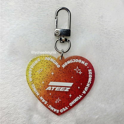ATEEZ Heart Keychain - MilkBunn Co. Front detail of keychain. Red to yellow ombre, glitter acrylic.